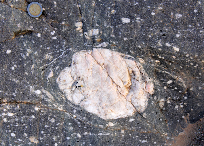 rotation of pegmatite clasts in ultramylonite